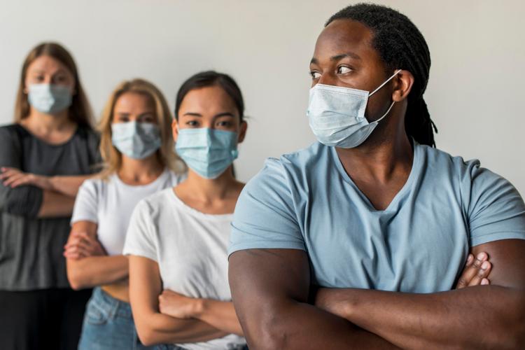 Group of friends wearing face masks